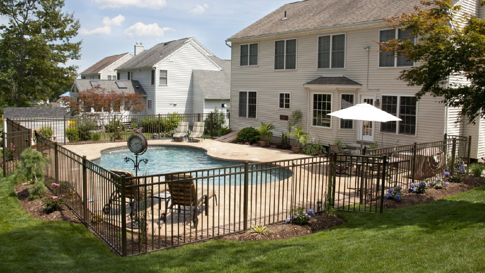 Steel Pool Fence in Suburban Backyard