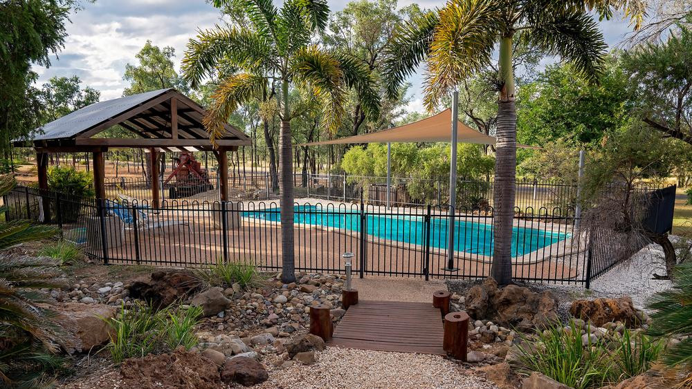 Aluminum Pool Fence in Landscaped Backyard