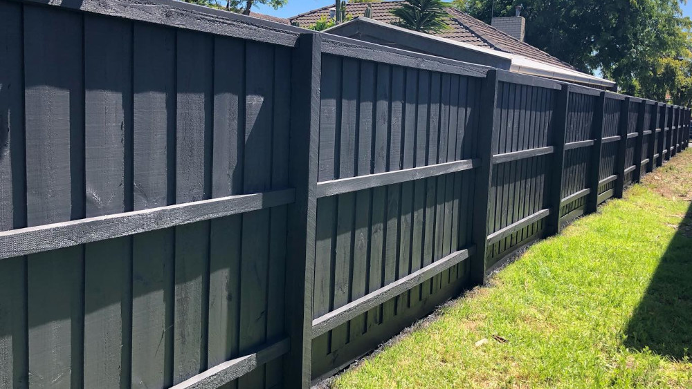 Bold Black Fence Paint Finish