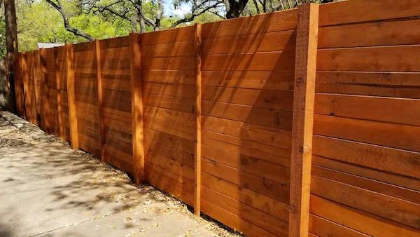 Contemporary Horizontal Fence Stained Finish