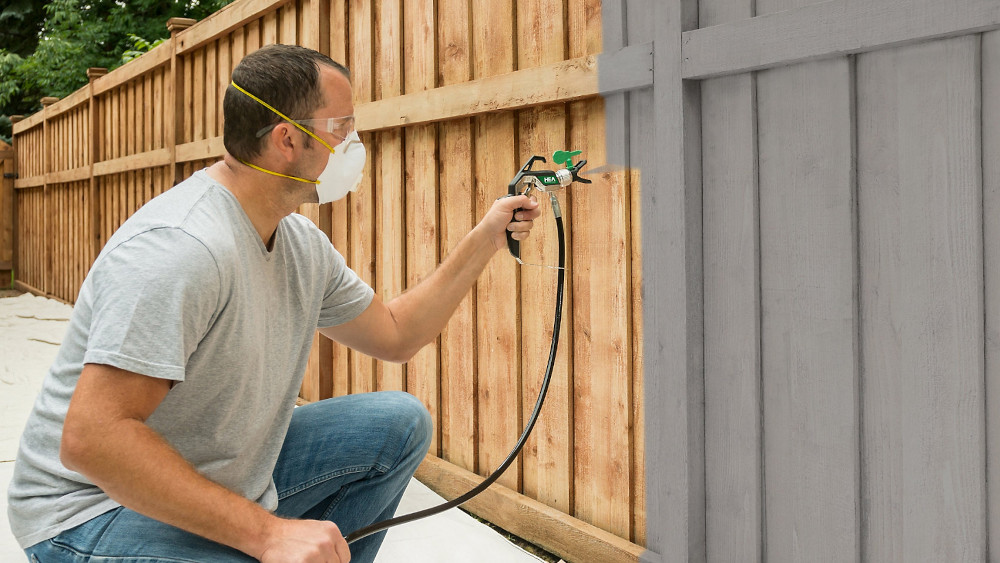 Spray Application of Grey Fence Paint